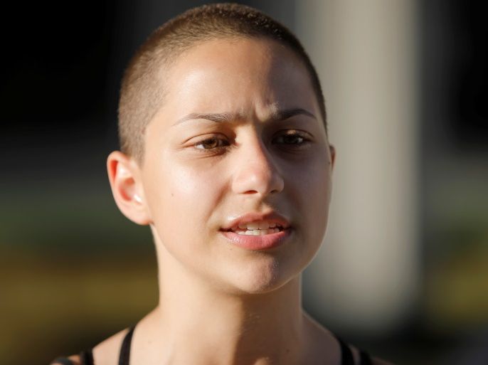 Emma Gonzalez, a senior at Marjory Stoneman Douglas High School, speaks to the media after calling for more gun control at a rally three days after the shooting at her school, in Fort Lauderdale, Florida, U.S. February 17, 2018. REUTERS/Jonathan Drake