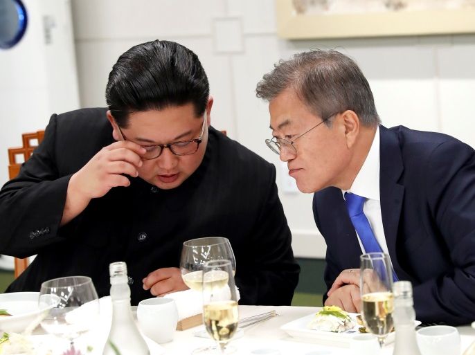 South Korean President Moon Jae-in and North Korean leader Kim Jong Un attend a banquet on the Peace House at the truce village of Panmunjom inside the demilitarized zone separating the two Koreas, South Korea, April 27, 2018. Korea Summit Press Pool/Pool via Reuters