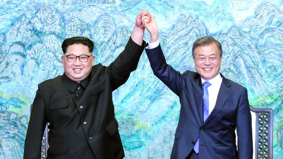 PANMUNJOM, SOUTH KOREA - APRIL 27:  North Korean leader Kim Jong Un (L) and South Korean President Moon Jae-in (R) pose for photographs after signing the Panmunjom Declaration for Peace, Prosperity and Unification of the Korean Peninsula during the Inter-Korean Summit at the Peace House on April 27, 2018 in Panmunjom, South Korea. Kim and Moon meet at the border today for the third-ever Inter-Korean summit talks after the 1945 division of the peninsula, and first since
