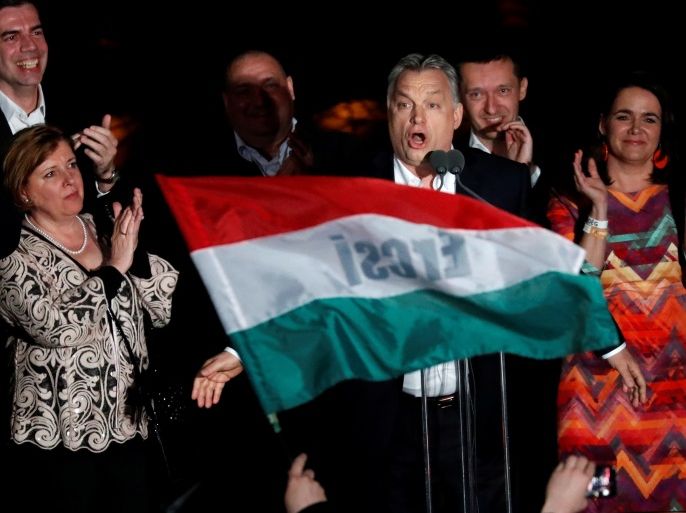 Hungarian Prime Minister Viktor Orban addresses supporters after the announcement of the partial results of parliamentary election in Budapest, Hungary, April 8, 2018. REUTERS/Bernadett Szabo