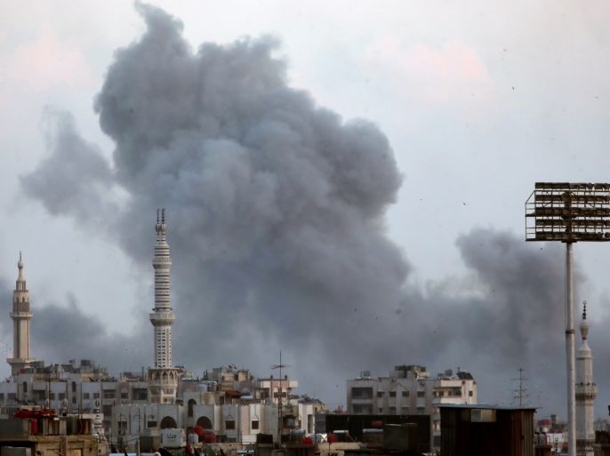 Smoke rises from Yarmouk Palestinian camp in Damascus, Syria April 21, 2018. REUTERS/Ali Hashisho