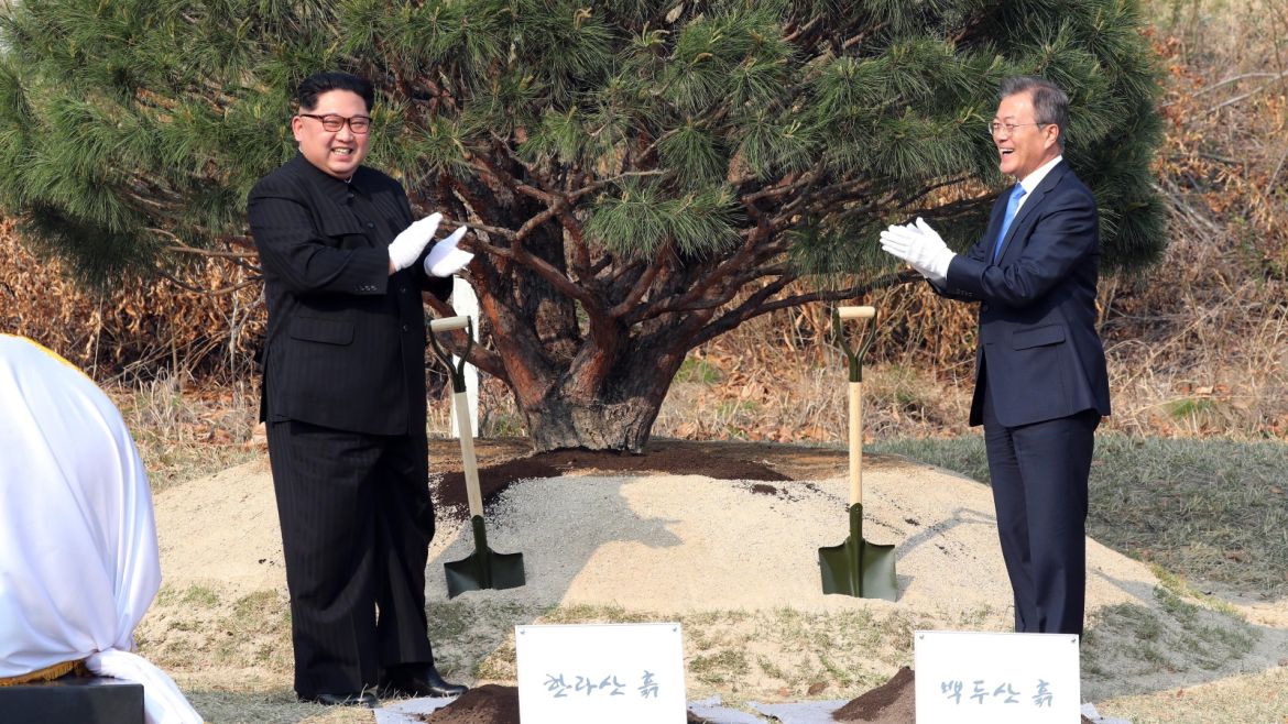 PANMUNJOM, SOUTH KOREA - APRIL 27:  North Korean leader Kim Jong Un (L) and South Korean President Moon Jae-in (R) attend the tree planting ceremony during the Inter-Korean Summit on April 27, 2018 in Panmunjom, South Korea. Kim and Moon meet at the border today for the third-ever Inter-Korean summit talks after the 1945 division of the peninsula, and first since 2007 between then President Roh Moo-hyun of South Korea and Leader Kim Jong-il of North Korea.  (Photo by Korea Summit Press Pool/Getty Images)