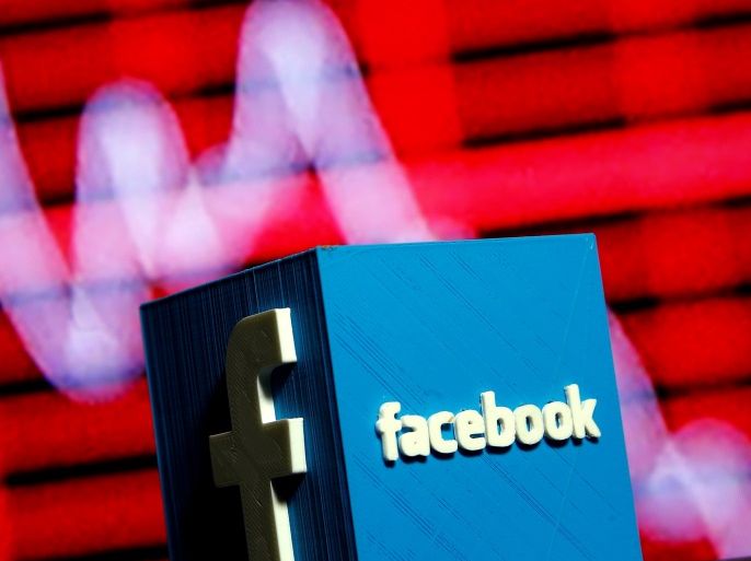 FILE PHOTO: A 3D-printed Facebook logo is seen in front of a displayed stock graph in this illustration taken November 3, 2016. REUTERS/Dado Ruvic/Illustration/File Photo