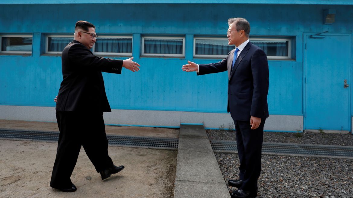 South Korean President Moon Jae-in and North Korean leader Kim Jong Un shake hands at the truce village of Panmunjom inside the demilitarized zone separating the two Koreas, South Korea, April 27, 2018.   Korea Summit Press Pool/Pool via Reuters