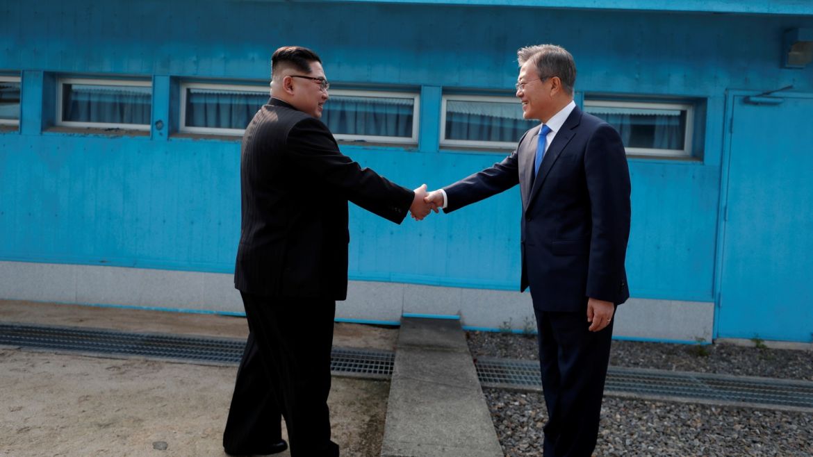 South Korean President Moon Jae-in shakes hands with North Korean leader Kim Jong Un during their meeting at the truce village of Panmunjom inside the demilitarized zone separating the two Koreas, South Korea, April 27, 2018.   Korea Summit Press Pool/Pool via Reuters