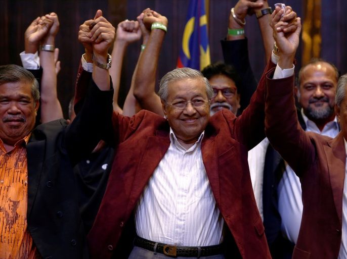 REFILE - CORRECTING DATE Mahathir Mohamad, former Malaysian prime minister and opposition candidate for Pakatan Harapan (Alliance of Hope) reacts during a news conference after general election, in Petaling Jaya, Malaysia, May 10, 2018. REUTERS/Lai Seng Sin