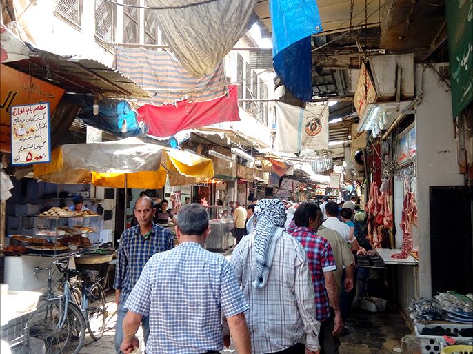 من أحد أسواق دمشق الشعبية في أول أيام رمضان 3 - الصورة حصرية للجزيرة نت