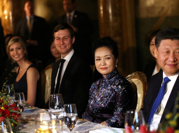 China's first lady Peng Liyuan looks at Chinese President Xi Jinping (R) as she sits next to Trump Senior Advisor Jared Kushner and Ivanka Trump (L), during a dinner at the start of a summit between U.S. President Donald Trump and Chinese President Xi at Trump's Mar-a-Lago estate in West Palm Beach, Florida, U.S. April 6, 2017. REUTERS/Carlos Barria