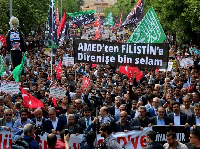 Pro-Palestinian demonstrators shout slogans during a protest against the U.S. embassy move to Jerusalem, in Diyarbakir, Turkey May 15, 2018. REUTERS/Sertac Kayar