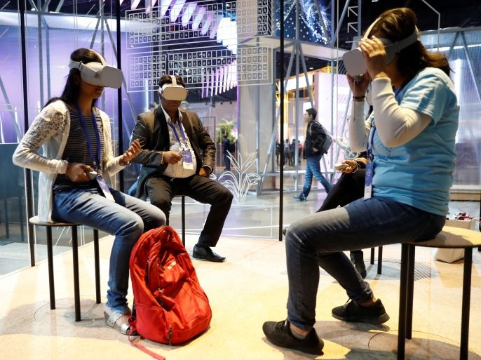 Attendees use Oculus Go virtual reality headsets during Facebook Inc's annual F8 developers conference in San Jose, California, U.S. May 1, 2018. REUTERS/Stephen Lam