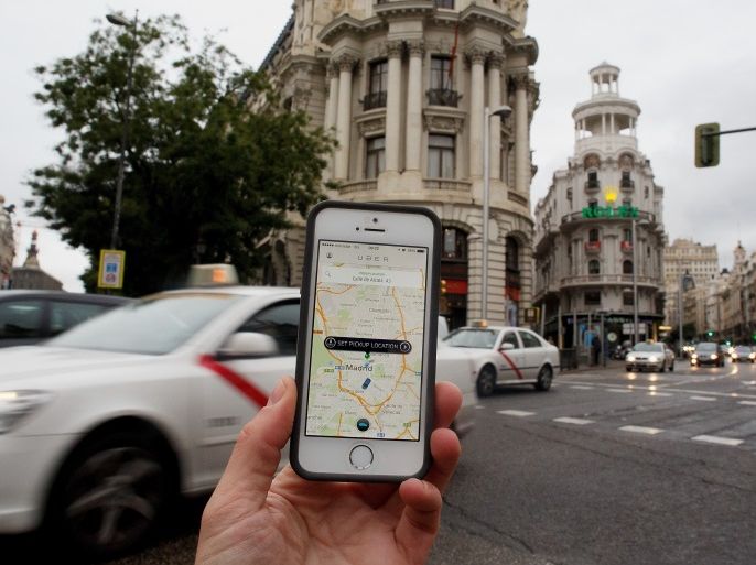 MADRID, SPAIN - OCTOBER 14: In this photo illustration the new smart phone taxi app 'Uber' shows how to select a pick up location at Alcala Street on October 14, 2014 in Madrid, Spain. 'Uber' application started to operate in Madrid last September despite Taxi drivers claim it is an illegal activity and its drivers currently operate without a license. 'Uber' is an American based company which is quickly expanding to some of the main cities from around the world. (Photo by Pablo Blazquez Dominguez/Getty Images)