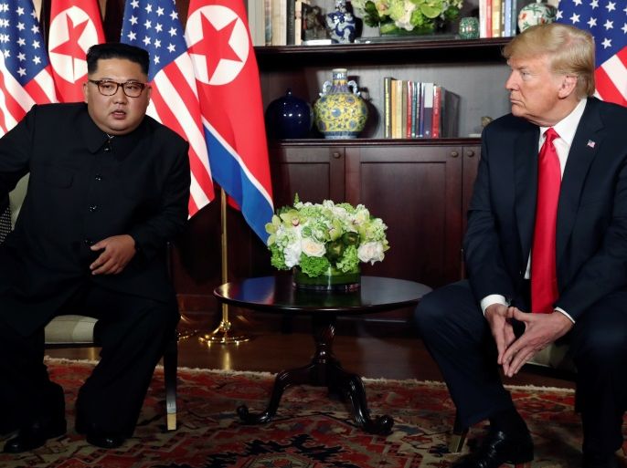 U.S. President Donald Trump and North Korea's leader Kim Jong Un meet in a one-on-one bilateral session at the start of their summit at the Capella Hotel on the resort island of Sentosa, Singapore June 12, 2018. Picture taken June 12, 2018. REUTERS/Jonathan Ernst