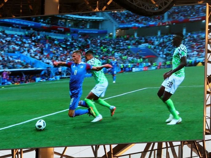 VOLGOGRAD, RUSSIA - JUNE 22: The big screen inside the stadium shows a VAR review in place which results in Iceland being awarded a penalty during the 2018 FIFA World Cup Russia group D match between Nigeria and Iceland at Volgograd Arena on June 22, 2018 in Volgograd, Russia. (Photo by Catherine Ivill/Getty Images)