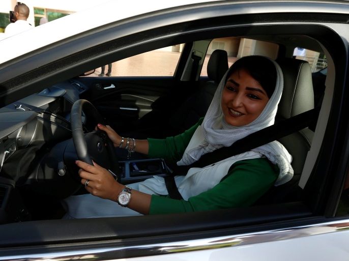 A Saudi woman sits in a car during a driving training at a university in Jeddah, Saudi Arabia March 7, 2018. REUTERS/Faisal Al Nasser