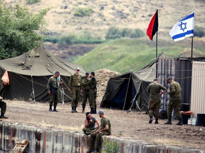 Israeli soldiers can be seen at a military outpost in the Israeli-occupied Golan Heights, Israel May 9, 2018. REUTERS/Amir Cohen
