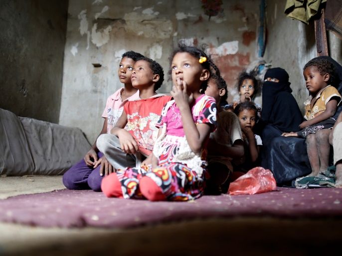 People displaced from the Red Sea port city of Hodeidah sit in a host family's house where they live on the outskirts of Sanaa, Yemen July 10, 2018. Picture taken July 10, 2018. REUTERS/Khaled Abdullah