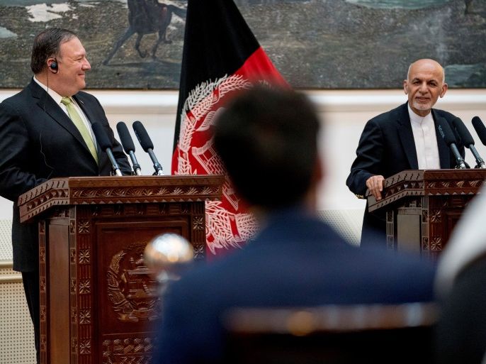 Afghan President Ashraf Ghani accompanied by U.S. Secretary of State Mike Pompeo speaks at a news conference at the Presidential Palace in Kabul, Afghanistan, July 9, 2018. Andrew Harnik/Pool via Reuters