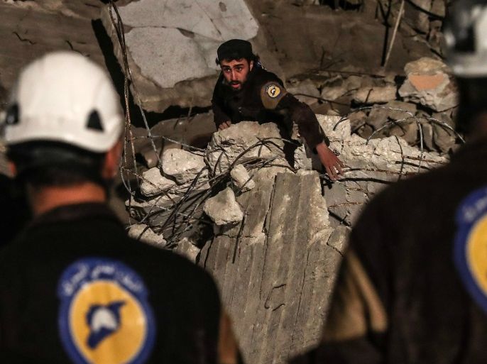 epa06903802 (FILE) - Volunteers of White Helmets search for survivors after an explosion in the city of Idlib, Syria, 09 April 2018, (reissued 22 July 2018). Media reports on 22 July 2018 state that around 800 White Helmets personnel and their families have been evacuated to Jordan via Israel, The Israel Defense Forces said. The White Helmets are a Syrian Civil Defence volunteer organisation. EPA-EFE/MOHAMMED BADRA