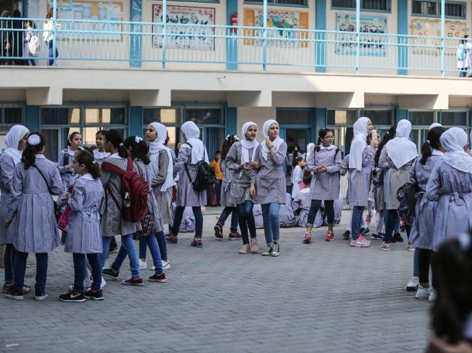 New school year starts in Gaza- - GAZA CITY, GAZA - AUGUST 29: Palestinian students start their new education year at schools of the United Nations Relief and Works Agency for Palestine Refugees (UNRWA) on the first day of the new school year in Gaza City, Gaza on August 29, 2018.
