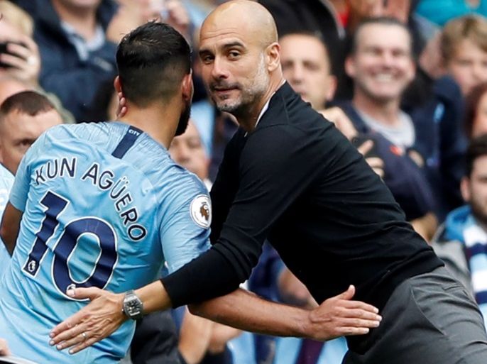Soccer Football - Premier League - Manchester City v Huddersfield Town - Etihad Stadium, Manchester, Britain - August 19, 2018 Manchester City manager Pep Guardiola hugs Sergio Aguero as he is substituted off Action Images via Reuters/Carl Recine EDITORIAL USE ONLY. No use with unauthorized audio, video, data, fixture lists, club/league logos or
