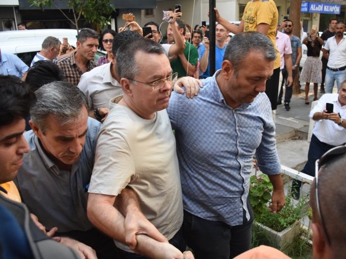 epa06910221 US pastor Andrew Brunson (C) is released from jail and will be put under house arrest during the duration of his trial, at Aliaga Prison in Izmir, Turkey, 25 July 2018. The US pastor has been in custody for two years under terror and espionage charges. EPA-EFE/MUSTAFA KOPRULU