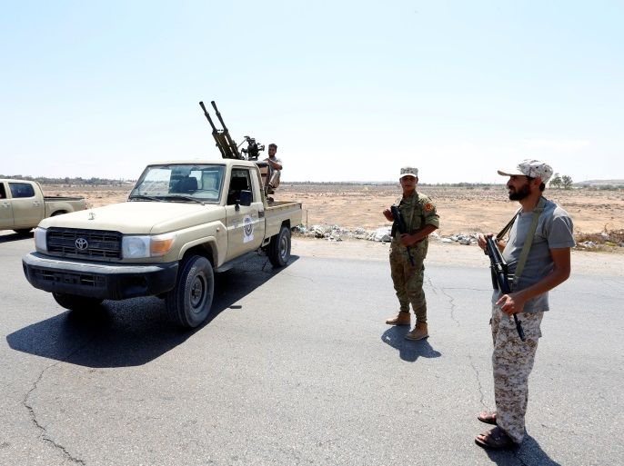 Soldiers are seen at a new checkpoint located near to the Kaam checkpoint after a gun attack in Zliten, east of Tripoli, Libya August 23, 2018. REUTERS/Ismail Zitouny