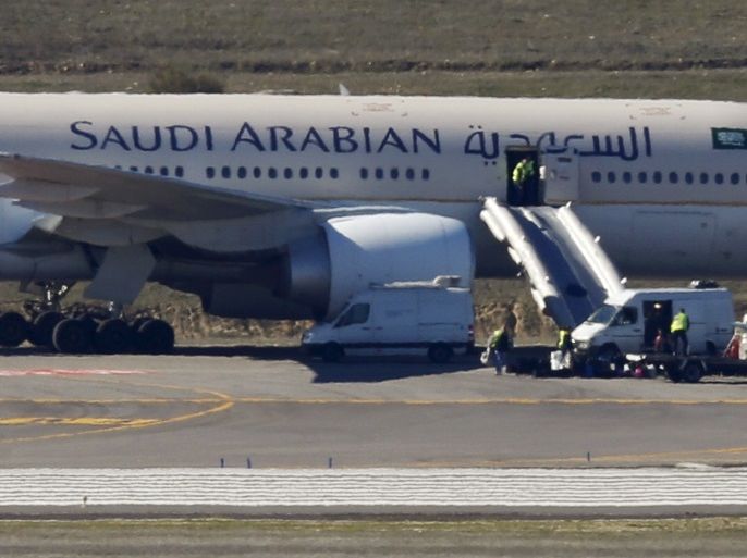 Saudi Arabian Airlines flight SVA 226 is isolated on the tarmac after its passengers and crew were evacuated following a bomb threat, at the Barajas airport in Madrid, Spain, February 4, 2016. REUTERS/Sergio Perez TPX IMAGES OF THE DAY