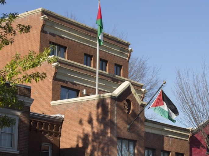 epa06348428 Palestinian flags fly at the office of the Palestine Liberation Organization (PLO) in Washington, DC, USA, 24 November 2017. The PLO has threatened to cut off ties with the US following the announcement of the Trump administration's intention to close the office in Washington. EPA-EFE/MICHAEL REYNOLDS