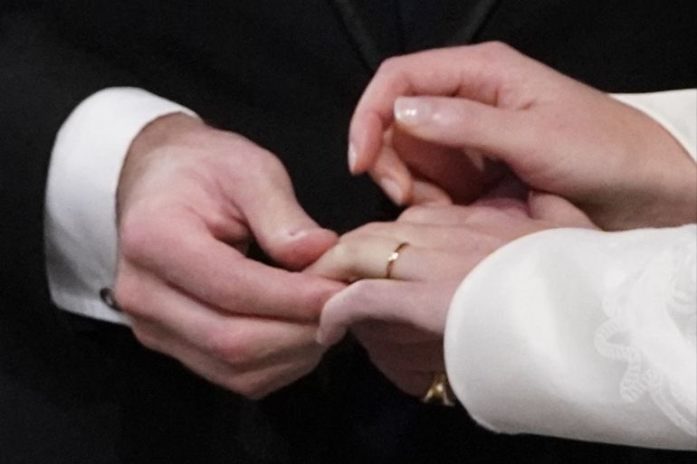 WINDSOR, ENGLAND - OCTOBER 12: A close-up view of the exchange of rings as Princess Eugenie of York and Mr. Jack Brooksbank are married at St. George's Chapel on October 12, 2018 in Windsor, England. (Photo by Danny Lawson - WPA Pool/Getty Images)