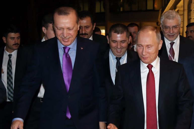 Turkish, Russian, Iranian presidents meet in Sochi- - SOCHI, RUSSIA - NOVEMBER 22: Turkish President Recep Tayyip Erdogan (L), Russian President Vladimir Putin (C) and Iranian President Hassan Rouhani (R) are seen after the trilateral summit to discuss progress on Syria, between the Presidents of Turkey, Russia and Iran on November 22, 2017 in Sochi, Russia.
