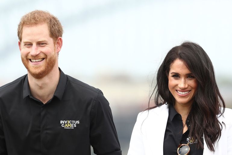 SYDNEY, AUSTRALIA - OCTOBER 20: Prince Harry, Duke of Sussex and Meghan, Duchess of Sussex smile during the JLR Drive Day at Cockatoo Island on October 20, 2018 in Sydney, Australia. (Photo by Mark Metcalfe/Getty Images for the Invictus Games Foundation)