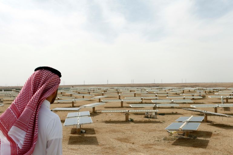 Saudi man looks at the solar plant in Uyayna, north of Riyadh, Saudi Arabia April 10, 2018. Picture taken April 10, 2018. REUTERS/Faisal Al Nasser