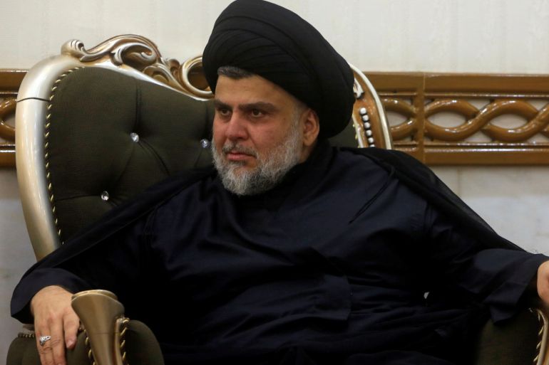 Iraqi Shi'ite radical Leader Muqtada al-Sadr meets with Turkish Foreign Minister Mevlut Cavusoglu in Najaf, Iraq October 11, 2018. REUTERS/Alaa al-Marjani
