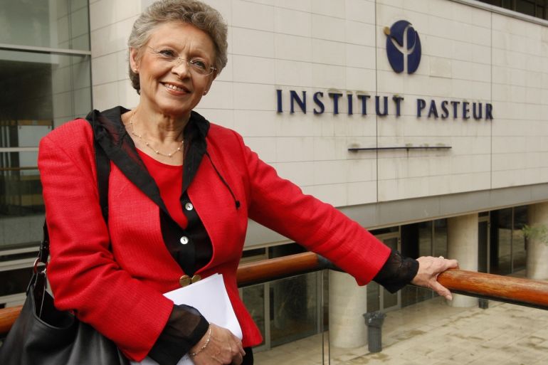 French virologist Francoise Barre-Sinoussi poses for the media before a news conference at the Institut Pasteur in Paris October 8, 2008. Two French scientists who discovered the AIDS virus and a German who bucked conventional wisdom to find a virus that causes cervical cancer were awarded the 2008 Nobel prize for medicine on Monday October 6, 2008. Luc Montagnier, director of the World Foundation for AIDS Research and Prevention, and Francoise Barre-Sinoussi of the Institut Pasteur won half the prize of 10 million Swedish crowns ($1.4 million) for discovering the virus that has killed 25 million people since it was identified in the 1980s. REUTERS/ Benoit Tessier (FRANCE)