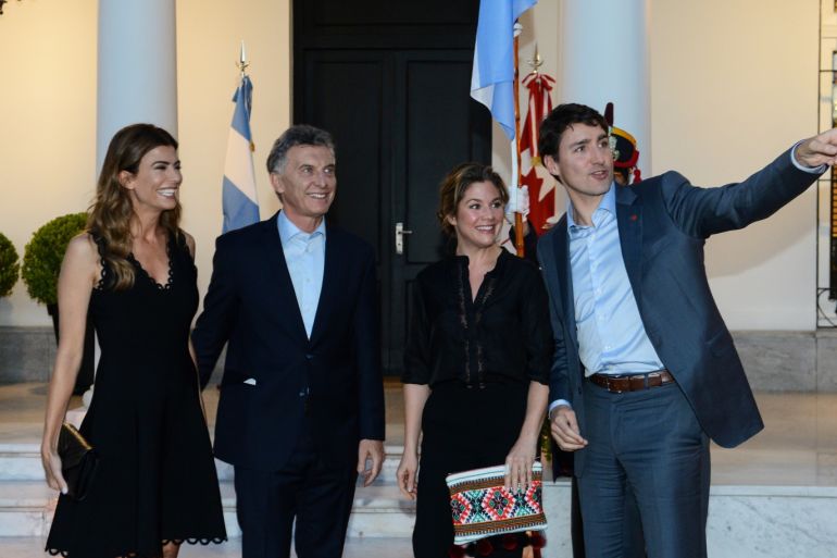 Canada's Prime Minister Justin Trudeau gestures alongside his wife Sophie Gregoire Trudeau, Argentina's President Mauricio Macri and his wife Juliana Awada at the Olivos Presidential Residence ahead of the G20 leaders summit in Buenos Aires, Argentina November 29, 2018. Picture taken November 29, 2018. Argentine Presidency/Handout via REUTERS ATTENTION EDITORS - THIS IMAGE WAS PROVIDED BY A THIRD PARTY.