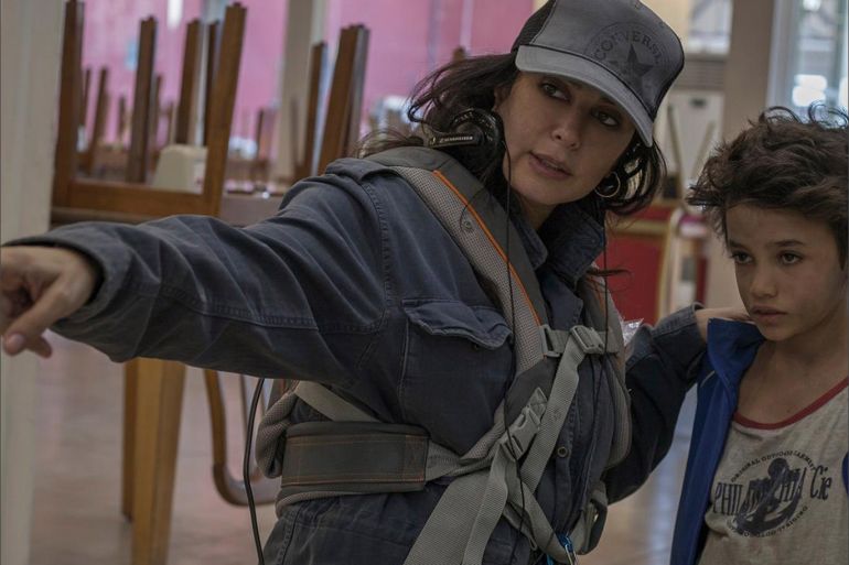 المخرجة اللبنانية نادين لبكي مع زين بطل فيلم كفرناحوم .