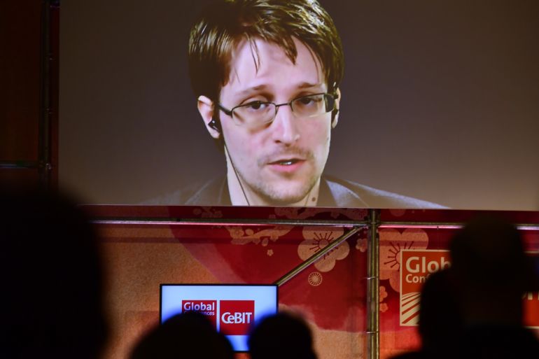 HANOVER, GERMANY - MARCH 21: Whistleblower Edward Snowden is broadcast live from Russia at the Sakura Stage at the CeBIT 2017 Technology Trade Fair on March 21, 2017 in Hanover, Germany. The 2017 CeBIT will run from March 20-24. (Photo by Alexander Koerner/Getty Images)