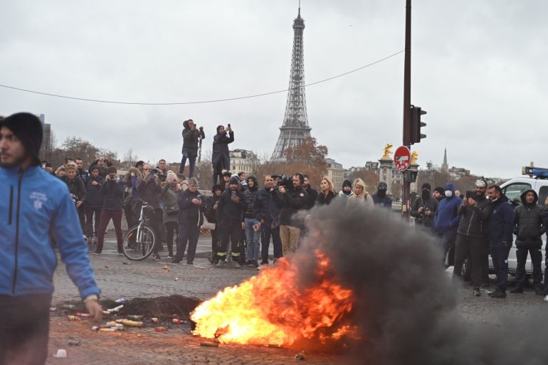 Protest of ambulance drivers in Paris- - PARIS, FRANCE - DECEMBER 3: Ambulance drivers burn tires as they protest against their working conditions, near the French National Assembly in Paris, on December 3, 2018.