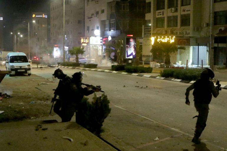 Israeli raid in Ramallah- - RAMALLAH, WEST BANK - DECEMBER 11: Palestinians clash with Israeli forces in response to their raid Palestinians houses and workplaces in Ramallah, West Bank on December 11, 2018.