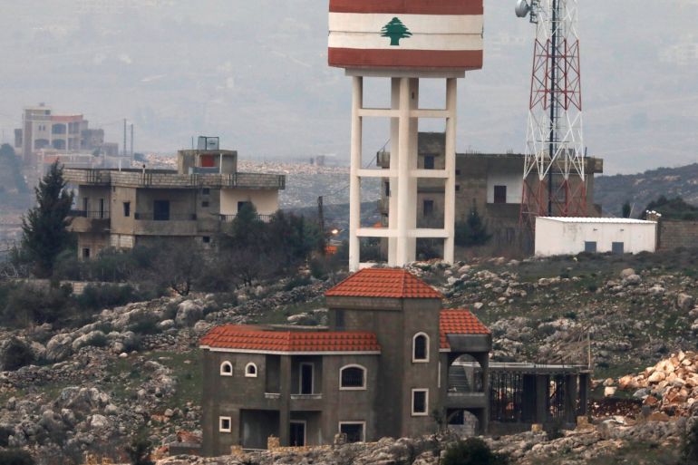 A general view shows a tower and buildings on the Lebanese side of the border between Israel and Lebanon, as it is seen from the Israeli side of the border December 9, 2018. REUTERS/Amir Cohen