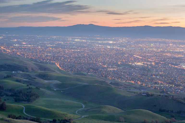 Silicon Valley and Green Hills at Dusk. Monument Peak, Ed R. Levin County Park, Santa Clara County, California, USA.