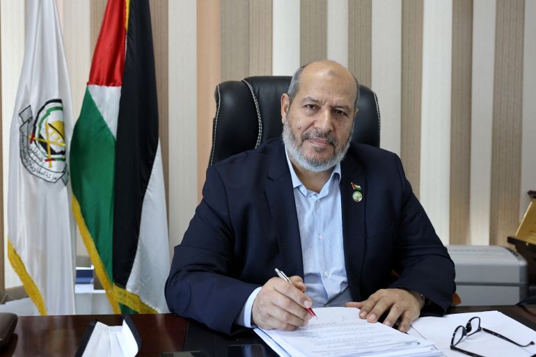 Khalil al-Hayya, senior leader and top Hamas legislative candidate, smiles during an interview with AFP at his office in Gaza City on April 21, 2021. Postponing elections "even for a single day" will push Palestinians "into the unknown", al-Hayya warned in an interview ahead of a long-awaited vote that is clouded with uncertainty. On May 22, Palestinians from the occupied West Bank, the Gaza Strip and east Jerusalem are scheduled to vote for the first time since 2006. (Photo by Emmanuel DUNAND / AFP)