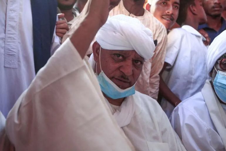 Sudanese Janjaweed militia chief Musa Hilal arrives to the Maamoura suburb of the capital Khartoum after his release, on March 11, 2021. - Sudan has released the powerful militia chief Musa Hilal, a UN-sanctioned leader of the once government-backed Janjaweed fighters, accused by rights groups of atrocities in Darfur, an aides said. (Photo by Ebrahim HAMID / AFP) (Photo by EBRAHIM HAMID/AFP via Getty Images)