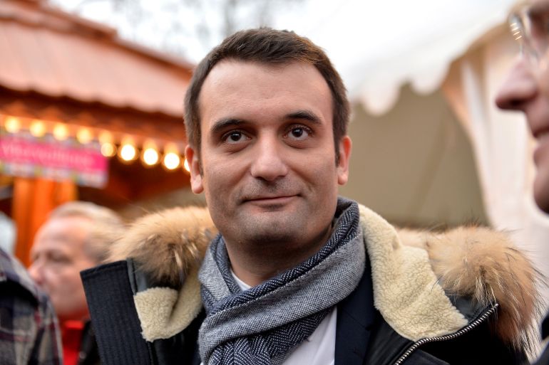 PARIS, FRANCE - DECEMBER 22: Florian Philippot National Front vice president visits the Christmas Market on the Champs Elysees on December 22 in Paris, France (Photo by Aurelien Meunier/Getty Images)