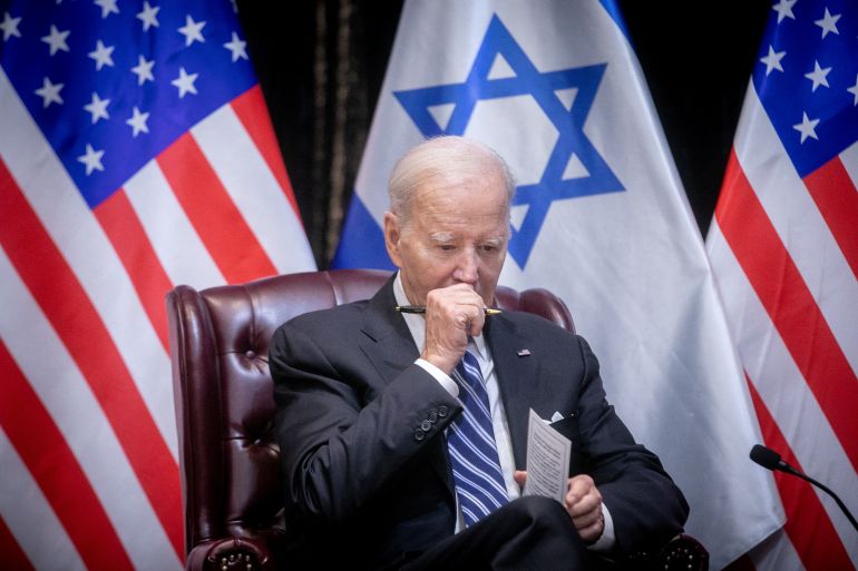 U.S. President Joe Biden pauses during a meeting with Israeli Prime Minister Benjamin Netanyahu, as they discuss the ongoing conflict between Israel and Hamas, in Tel Aviv, Israel, Wednesday, Oct. 18, 2023. Miriam Alster/Pool via REUTERS