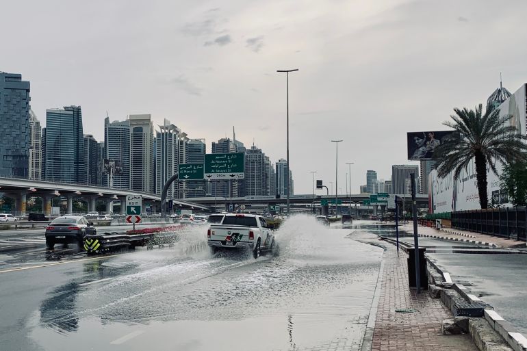 Dubai / United Arab Emirates - November 9, 2019: flooding and heavy rain in Media City with Marina in the background