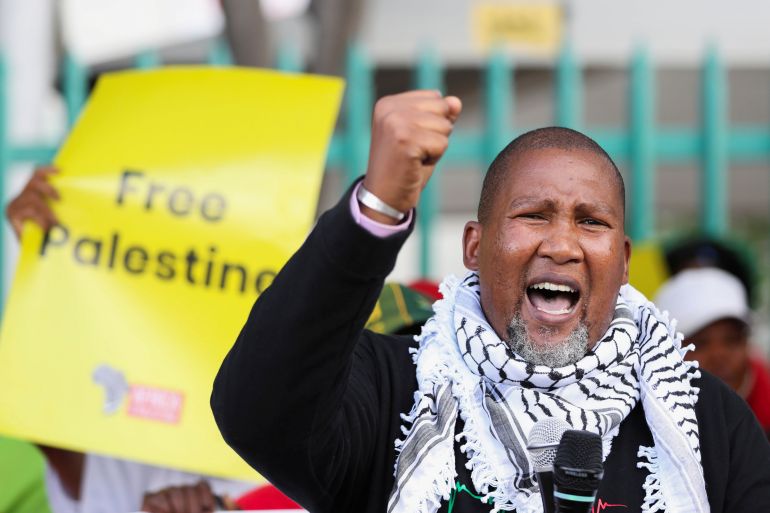 Nelson Mandela's eldest grandson, Mandla Mandela, gestures during a protest by Palestinian supporters calling for Miss SA, Lalela Mswane to withdraw from the Miss Universe pageant in Israel, outside the Miss South Africa headquarters in Johannesburg, South Africa, November 19, 2021. REUTERS/Siphiwe Sibeko
