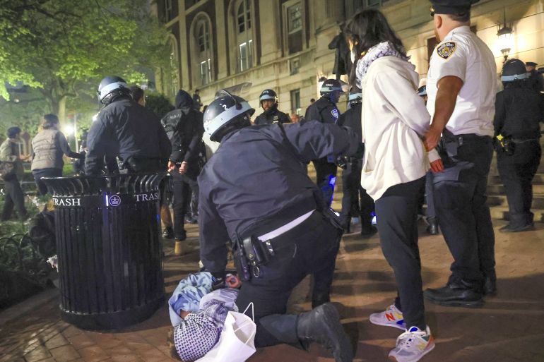 NEW YORK, UNITED STATES - APRIL 30: New York Police Department officers detain dozens of pro-Palestinian students at Columbia University after they barricaded themselves at the Hamilton Hall building near Gaza Solidarity Encampment earlier in New York, United States on April 30, 2024. (Photo by Selcuk Acar/Anadolu via Getty Images)