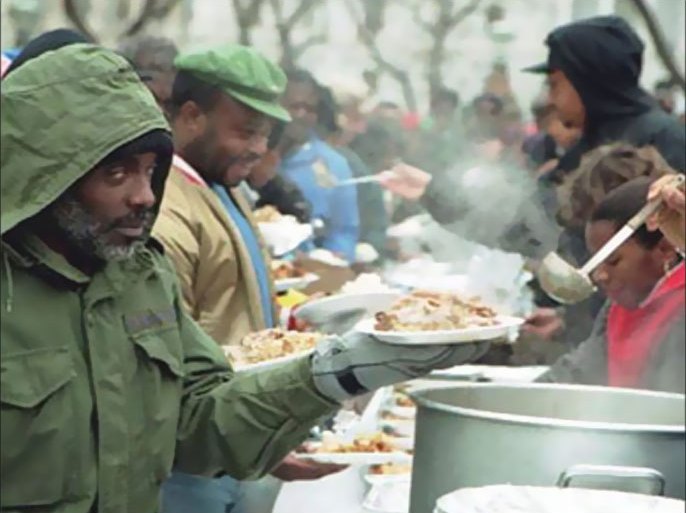 Poor and homeless people in line for Thanksgiving Day dinner, US Capitol, Washington DC