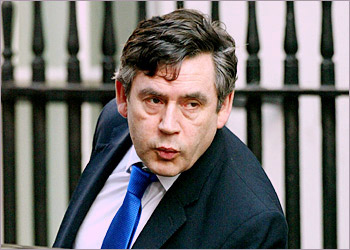 Britain's Chancellor of the Exchequer Gordon Brown leaves Downing Street following a war cabinet meeting in London, March 31, 2003. Britons' backing for the war against Iraq has fallen for the first time since the conflict began, an opinion poll published on Monday found. REUTERS/Toby Melville